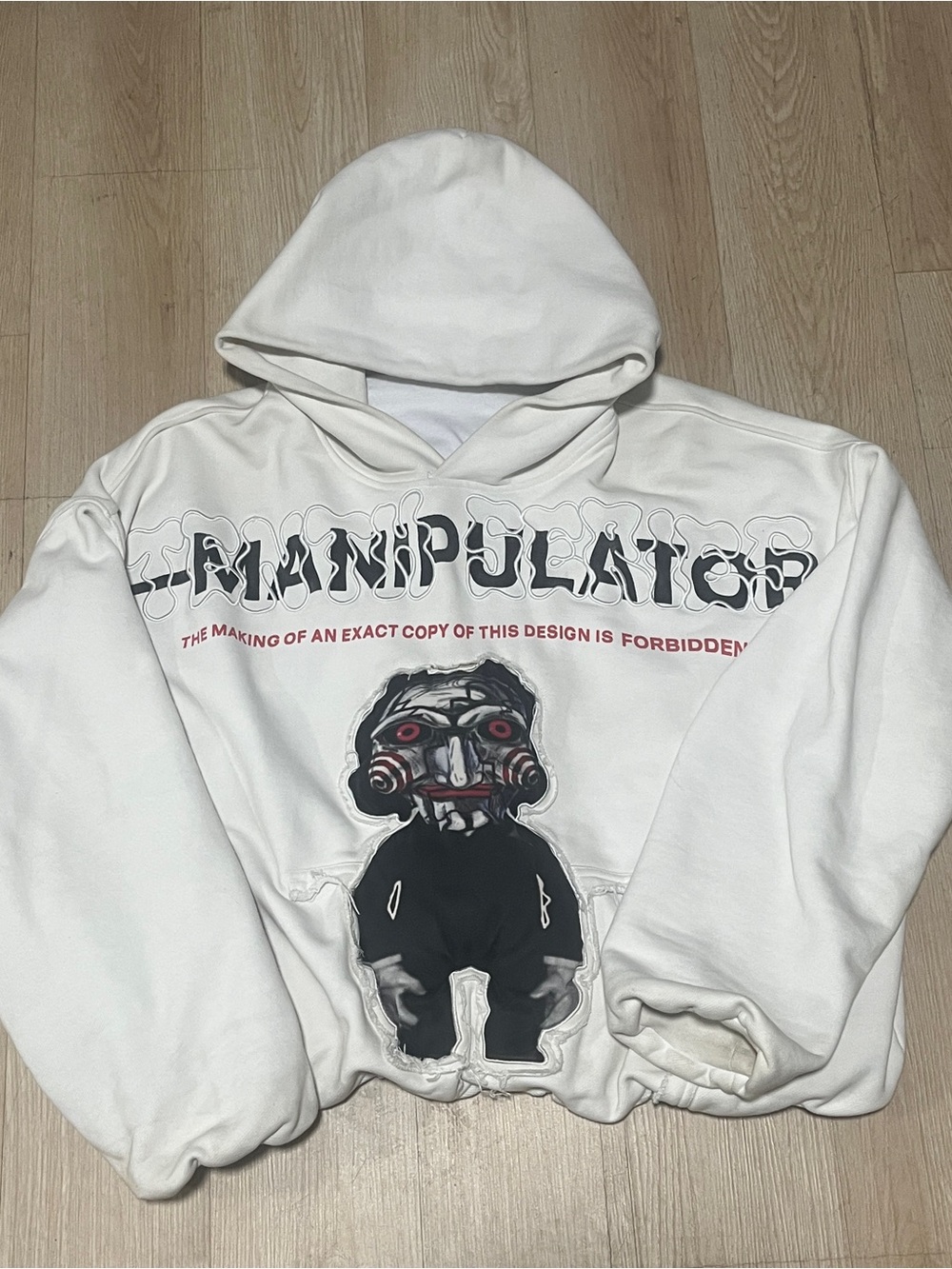 White Graphic Hooded Sweatshirt with Doll Motif